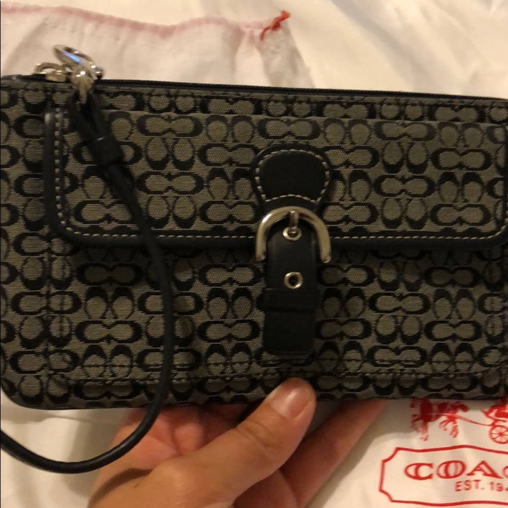 Authentic coach wristlet with dust bag